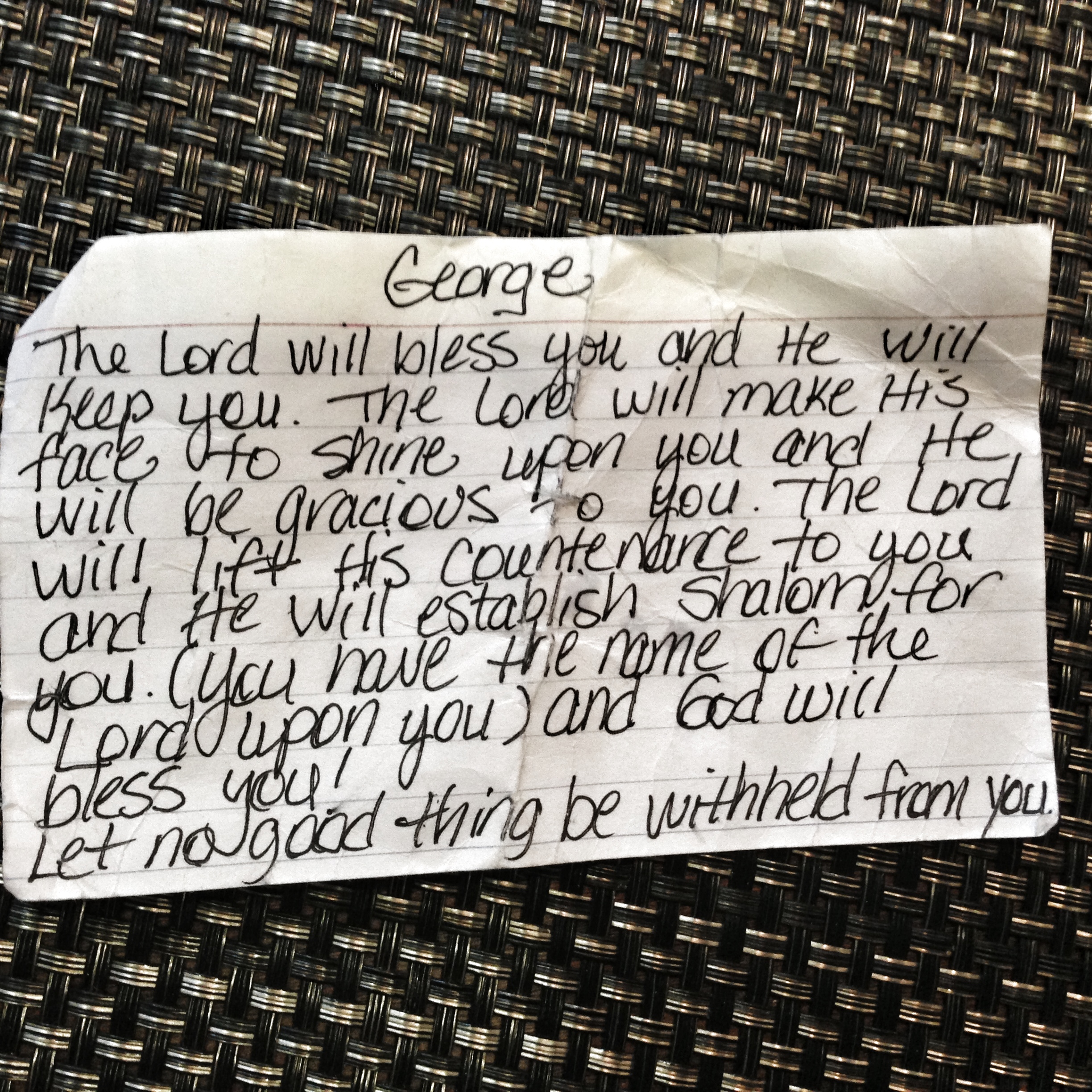a note card found on the floor at the airport